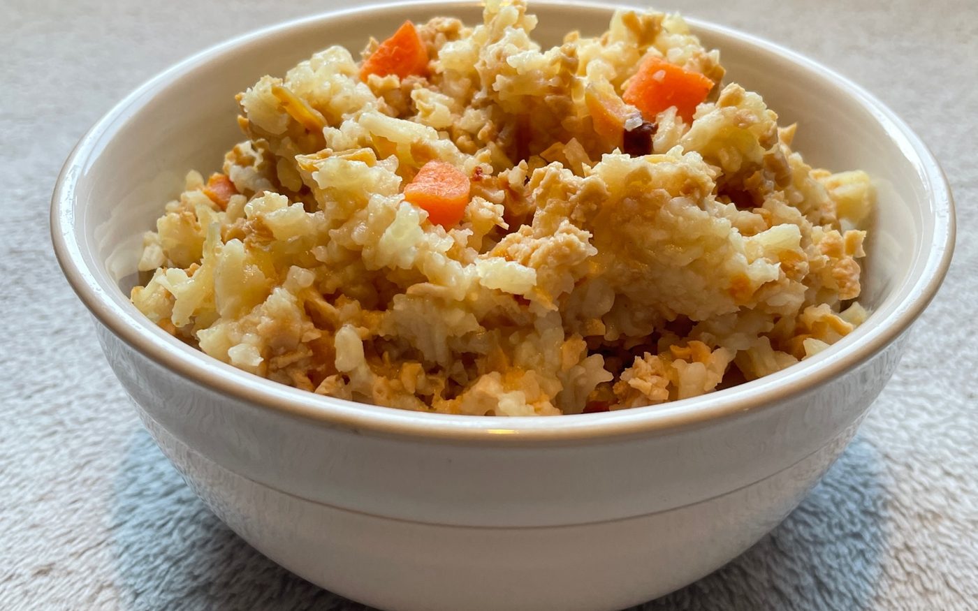 A bowl of prepared Harvest Pack rice pilaf with carrots and vegetables